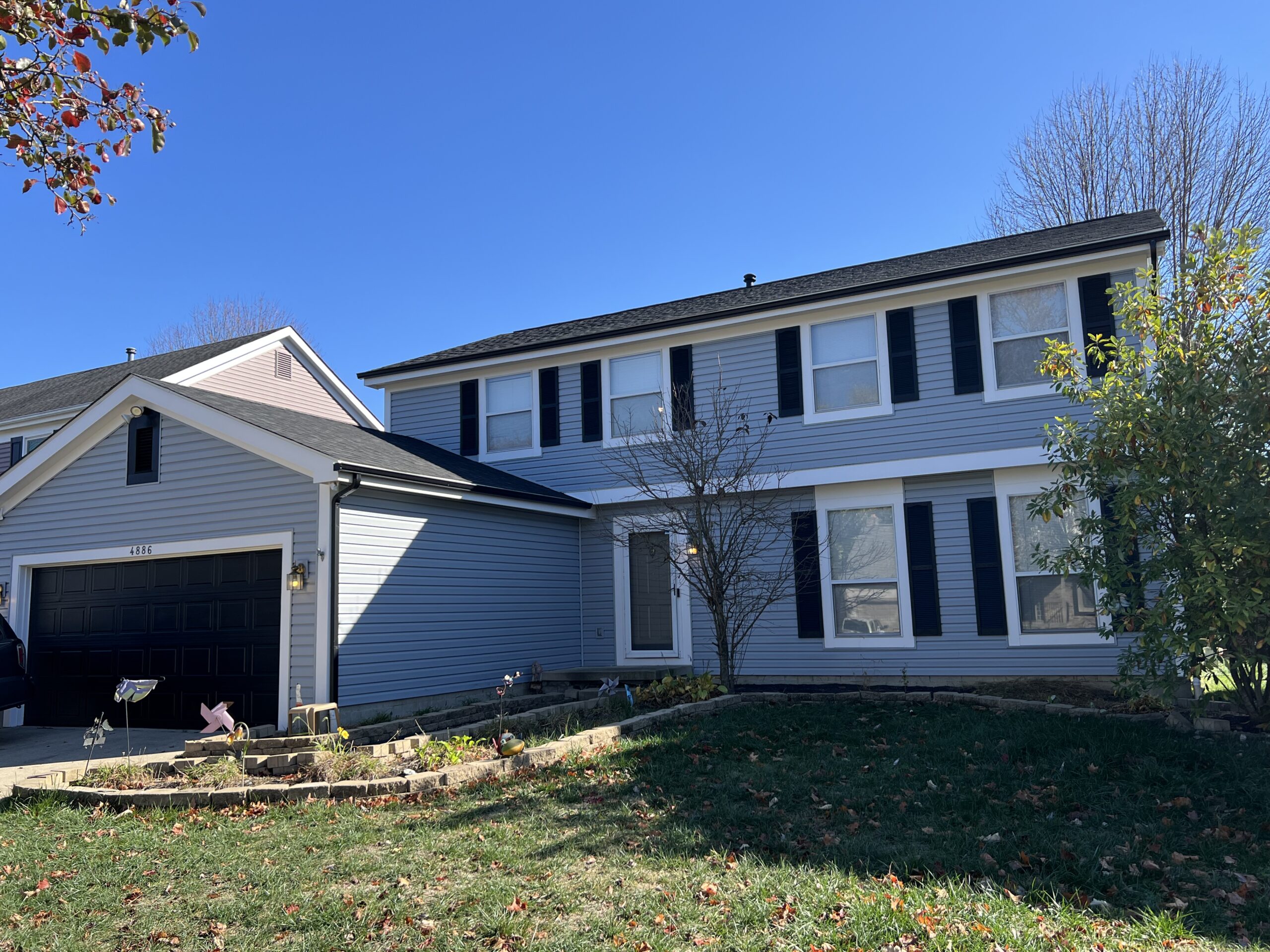Green Diamond Painting professionals working on exterior home painting in Dublin, OH