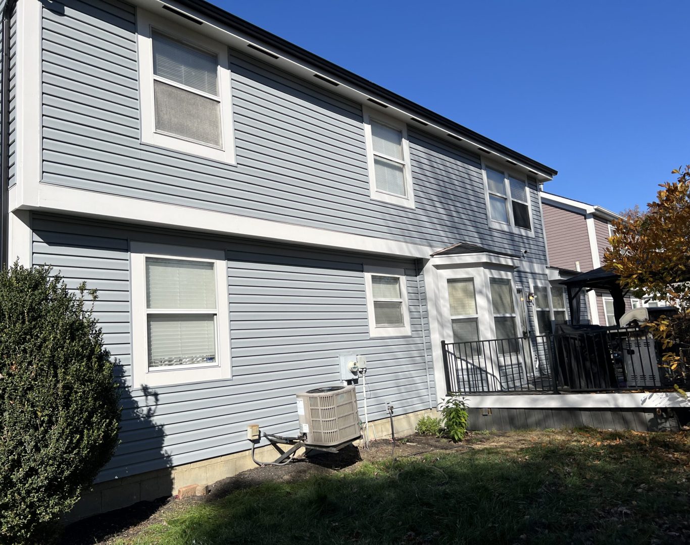 Professional exterior residential painting in Columbus, OH, showcasing a beautifully refreshed home.