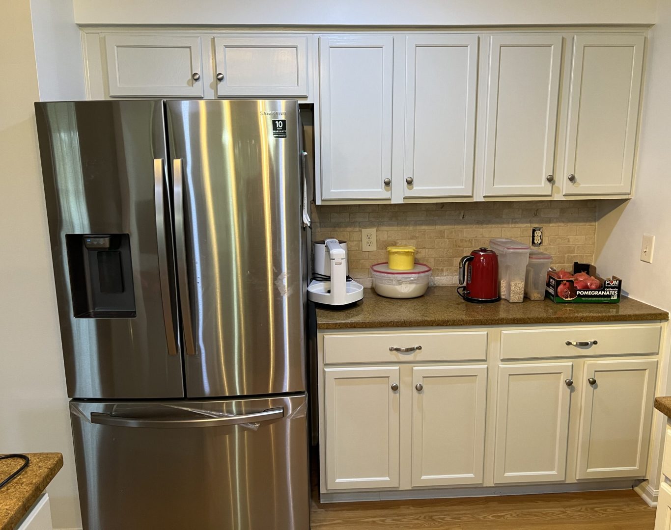 Professional painter applying a fresh coat of paint to a home in Grove City, OH